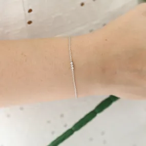 0.06 TCW Round Moissanite Three Diamond Bracelet